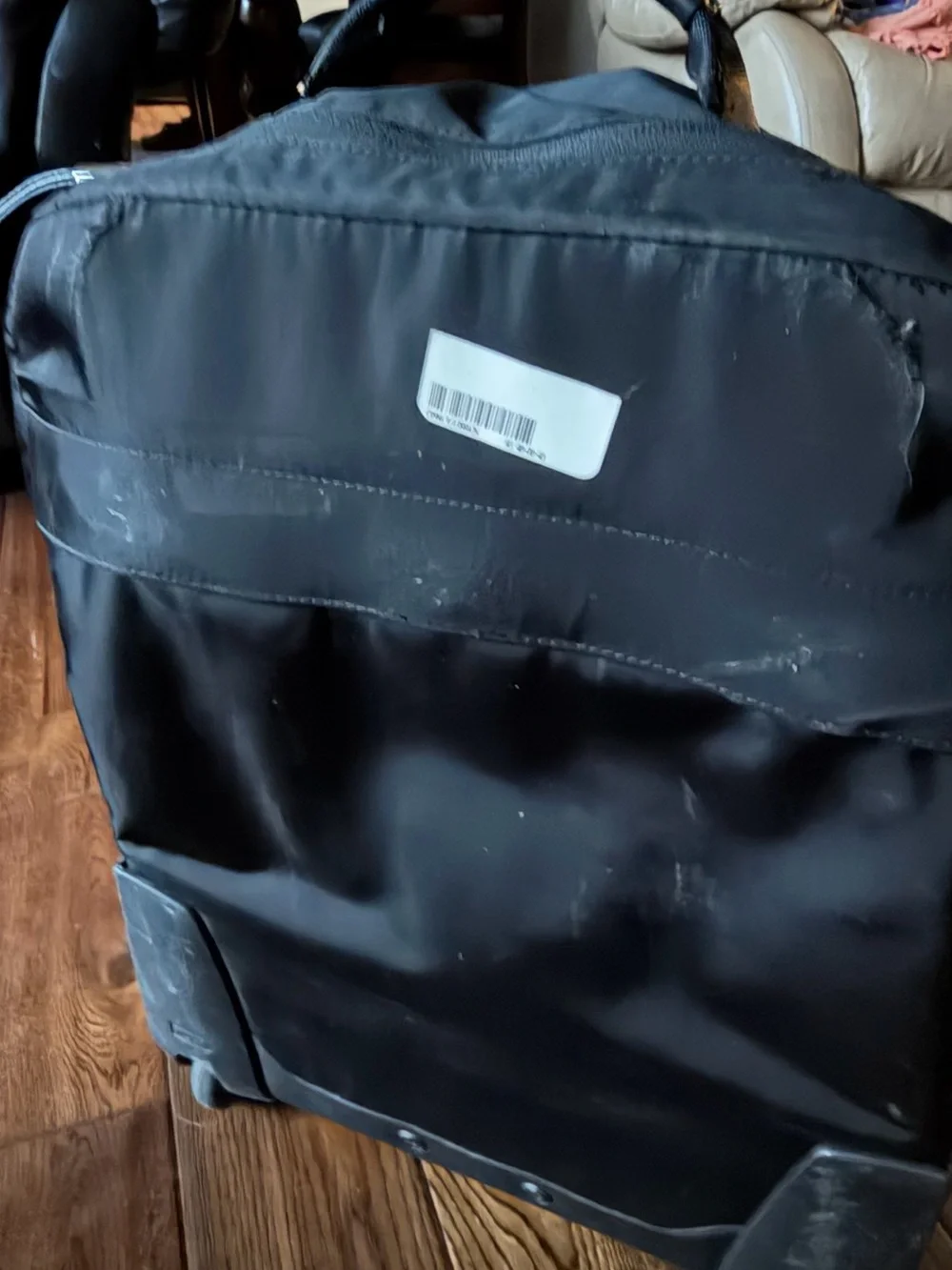 Tumi Black Travel Backpack with Gold Zipper Accents